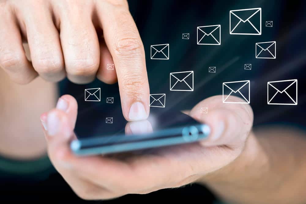 Image is of text messages displayed on a smartphone, concept of an alienation of affection attorney reviewing digital communications as evidence.