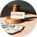 Wooden gavel resting on a nameplate reading alimony